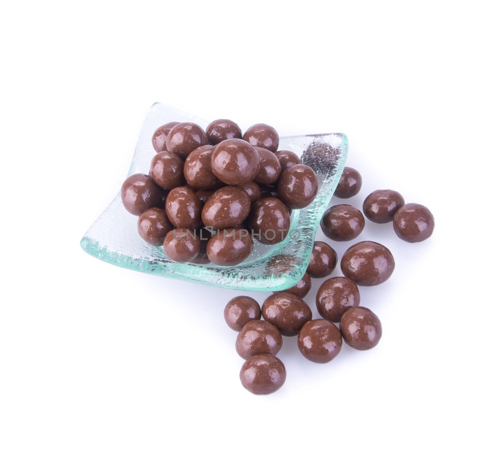 chocolate balls. chocolate balls in bowl on a background.