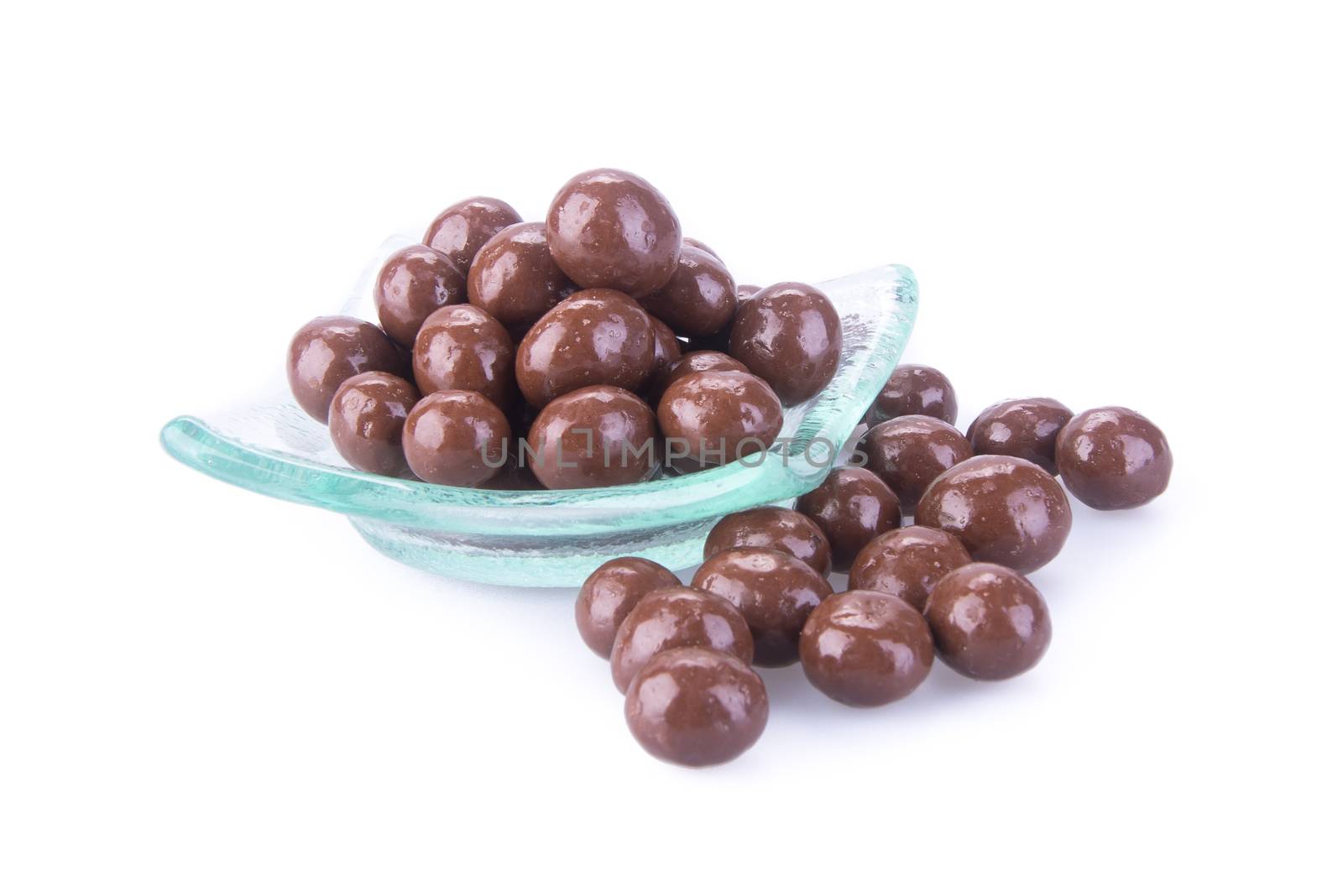 chocolate balls. chocolate balls in bowl on a background.