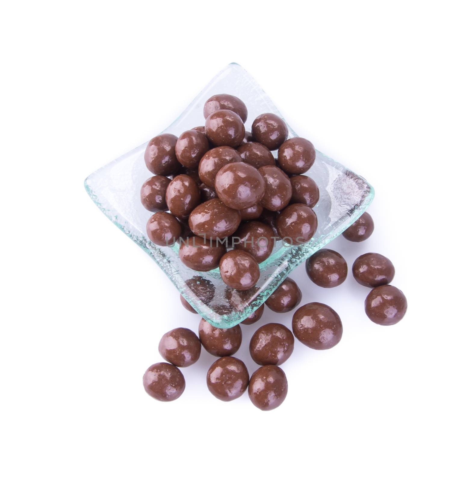 chocolate balls. chocolate balls in bowl on a background.