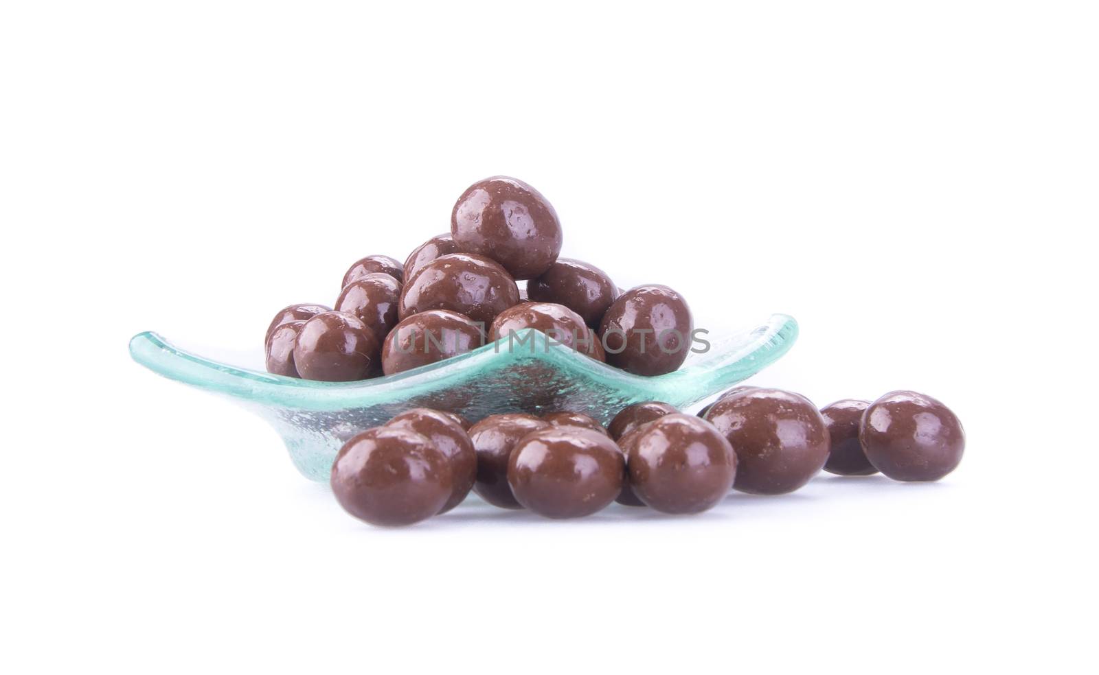 chocolate balls. chocolate balls in bowl on a background by heinteh