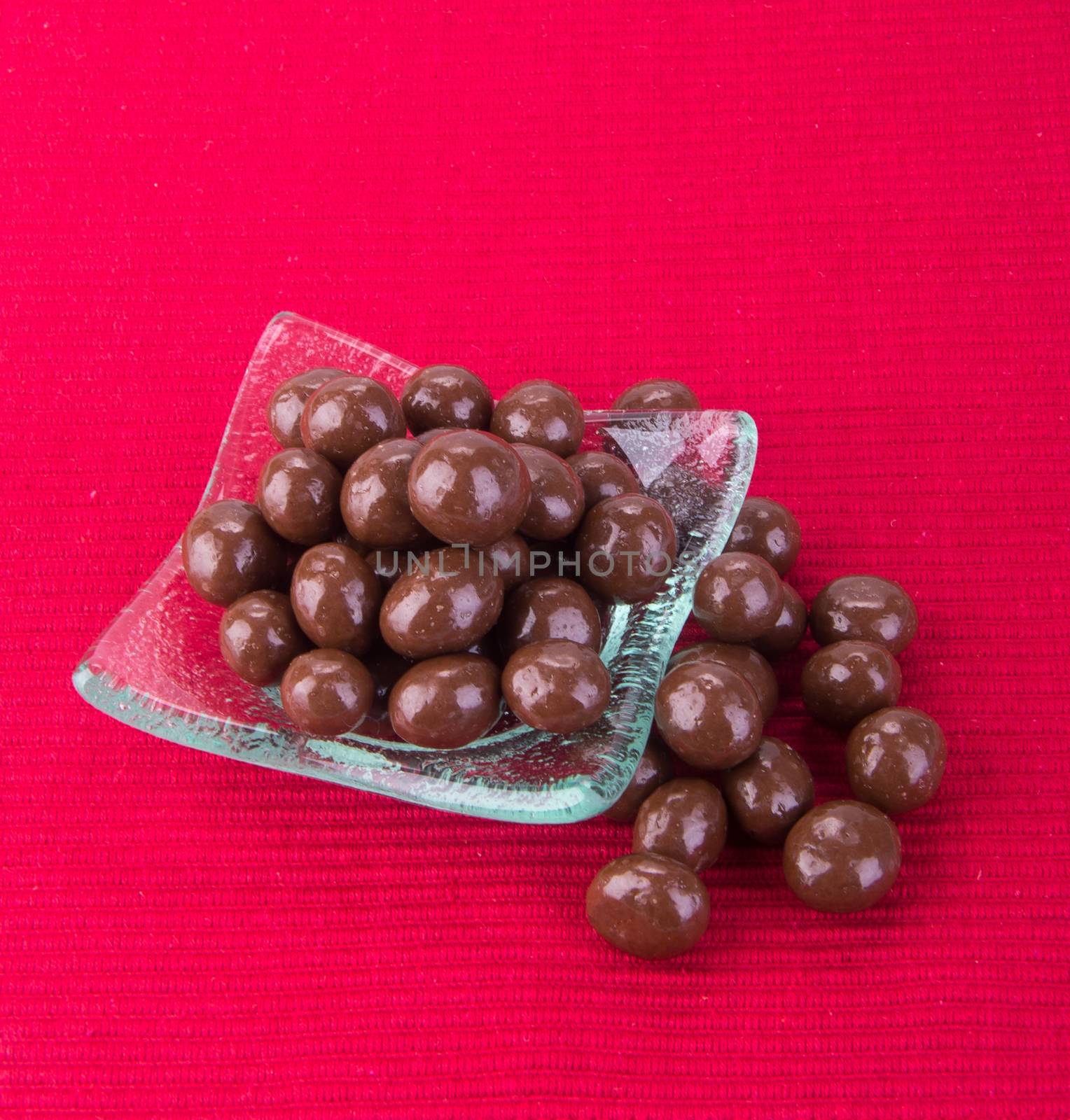 chocolate balls. chocolate balls in bowl on a background by heinteh