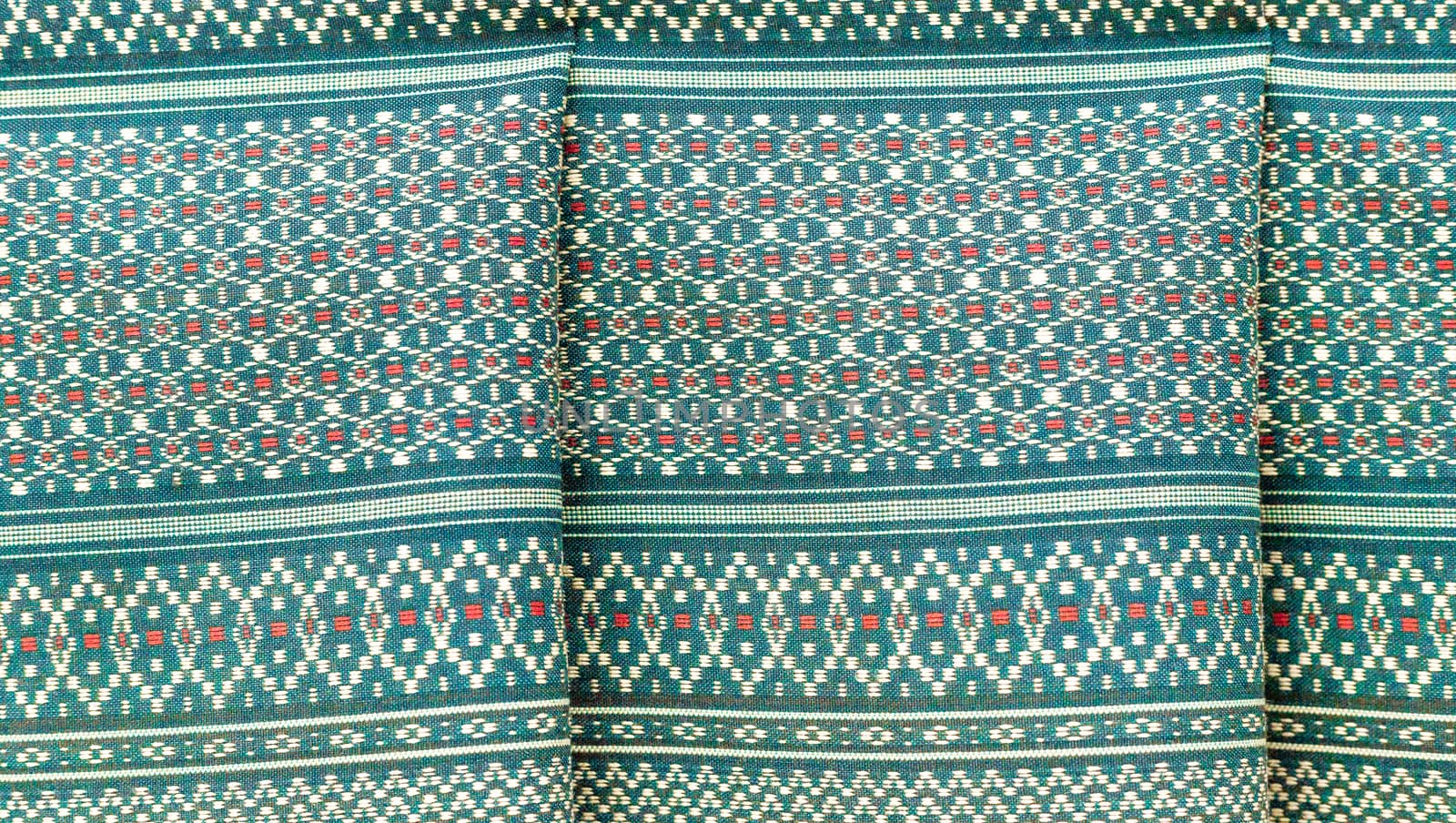 Vintage traditional Thai handmade fabric texture background by nopparats