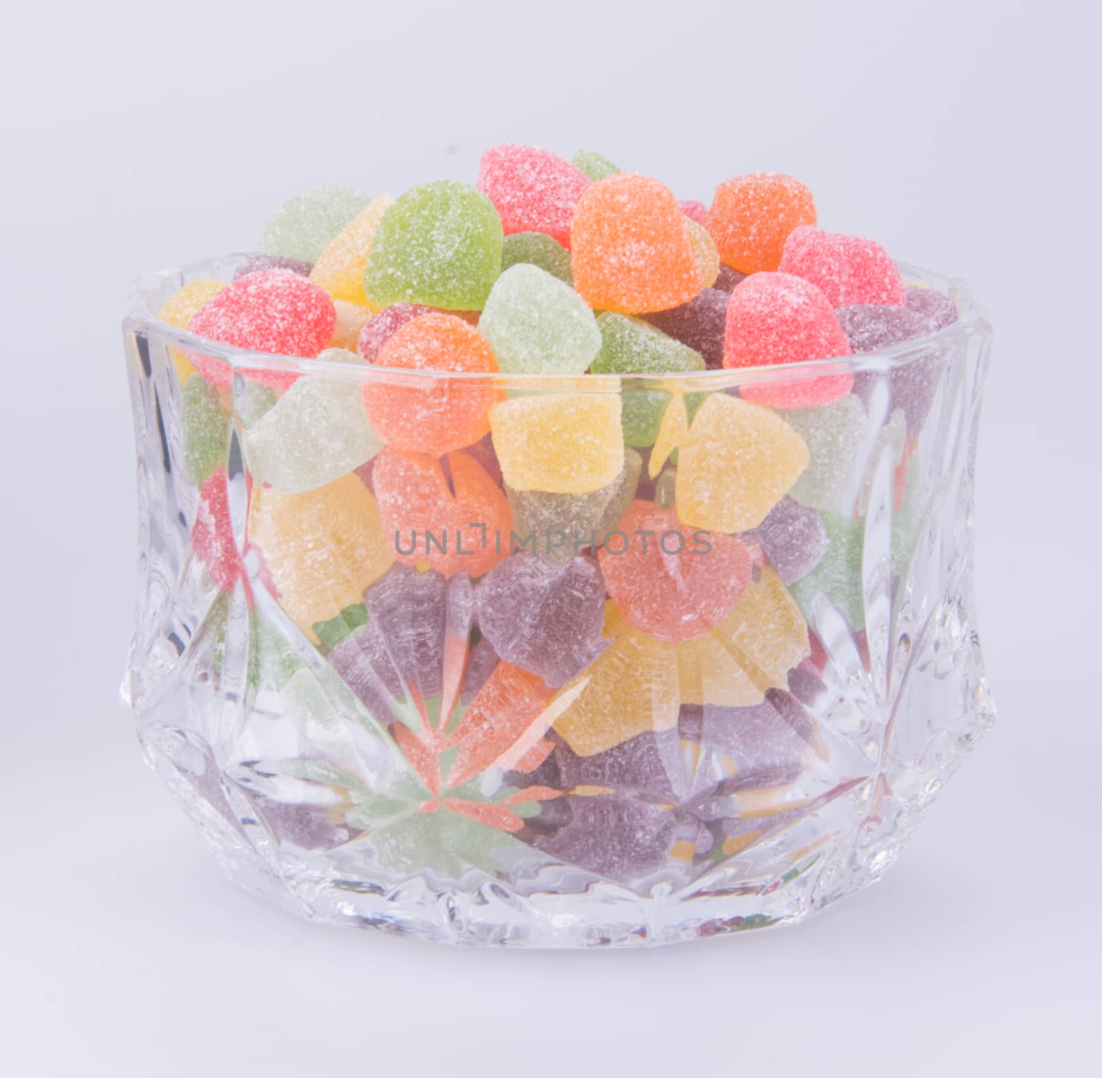 candies. jelly candies in glass bowl on a background.