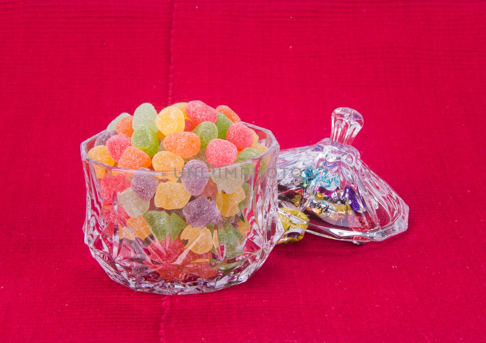 candies. jelly candies in glass bowl on a background.