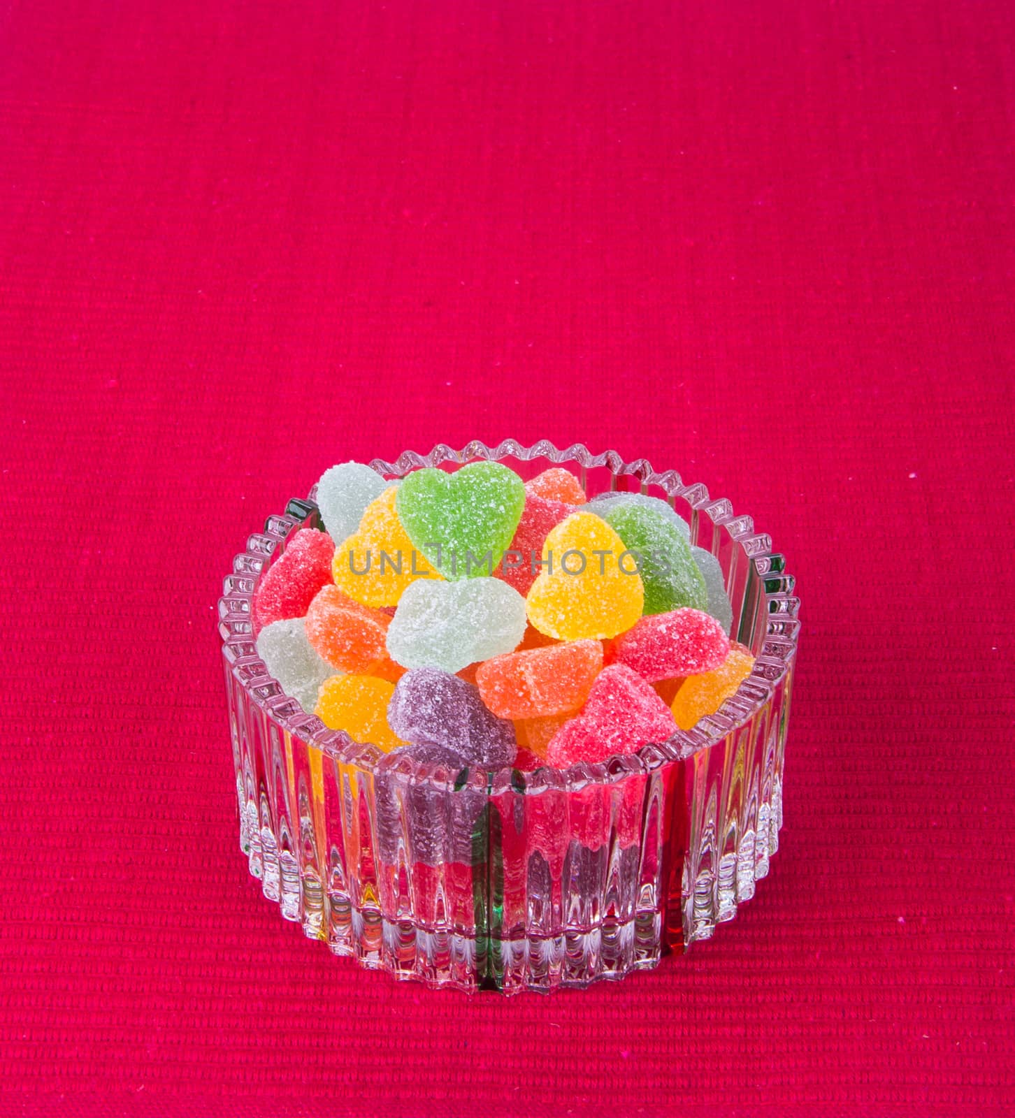 candies. jelly candies in glass bowl on a background.