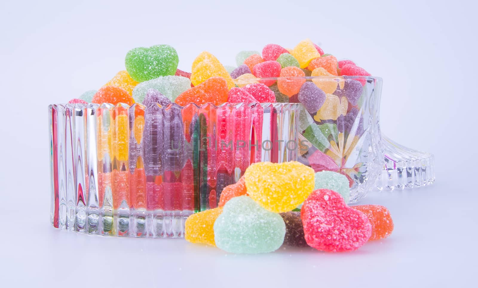 candies. jelly candies in glass bowl on a background.