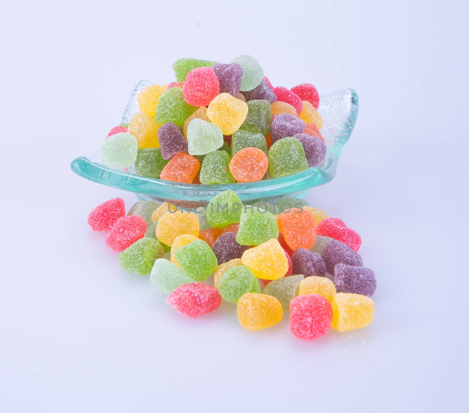 candies. jelly candies in glass bowl on a background.