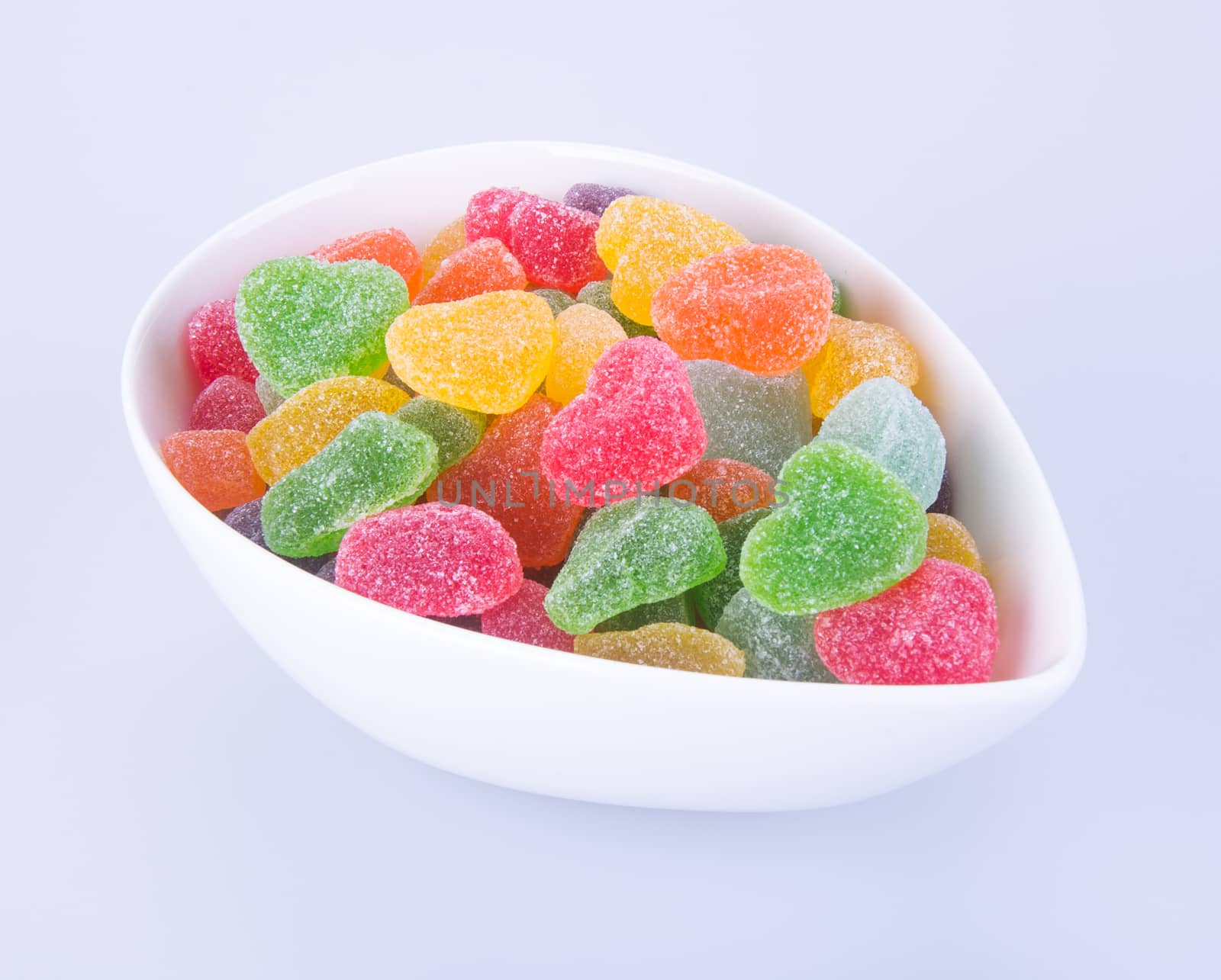 candies. jelly candies in bowl on a background. jelly candies in bowl on a background.