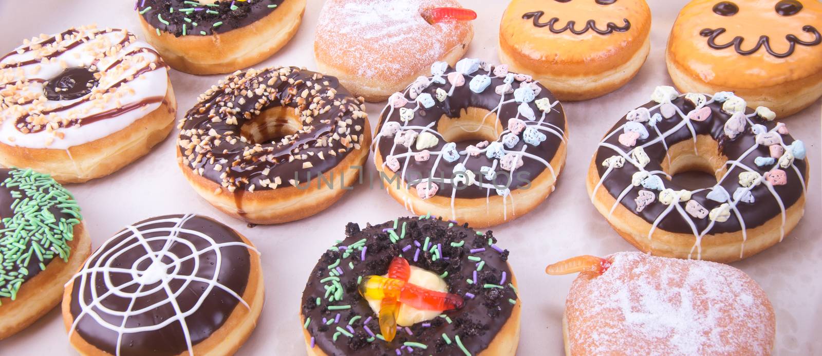 Assorted donuts donuts on a background by heinteh