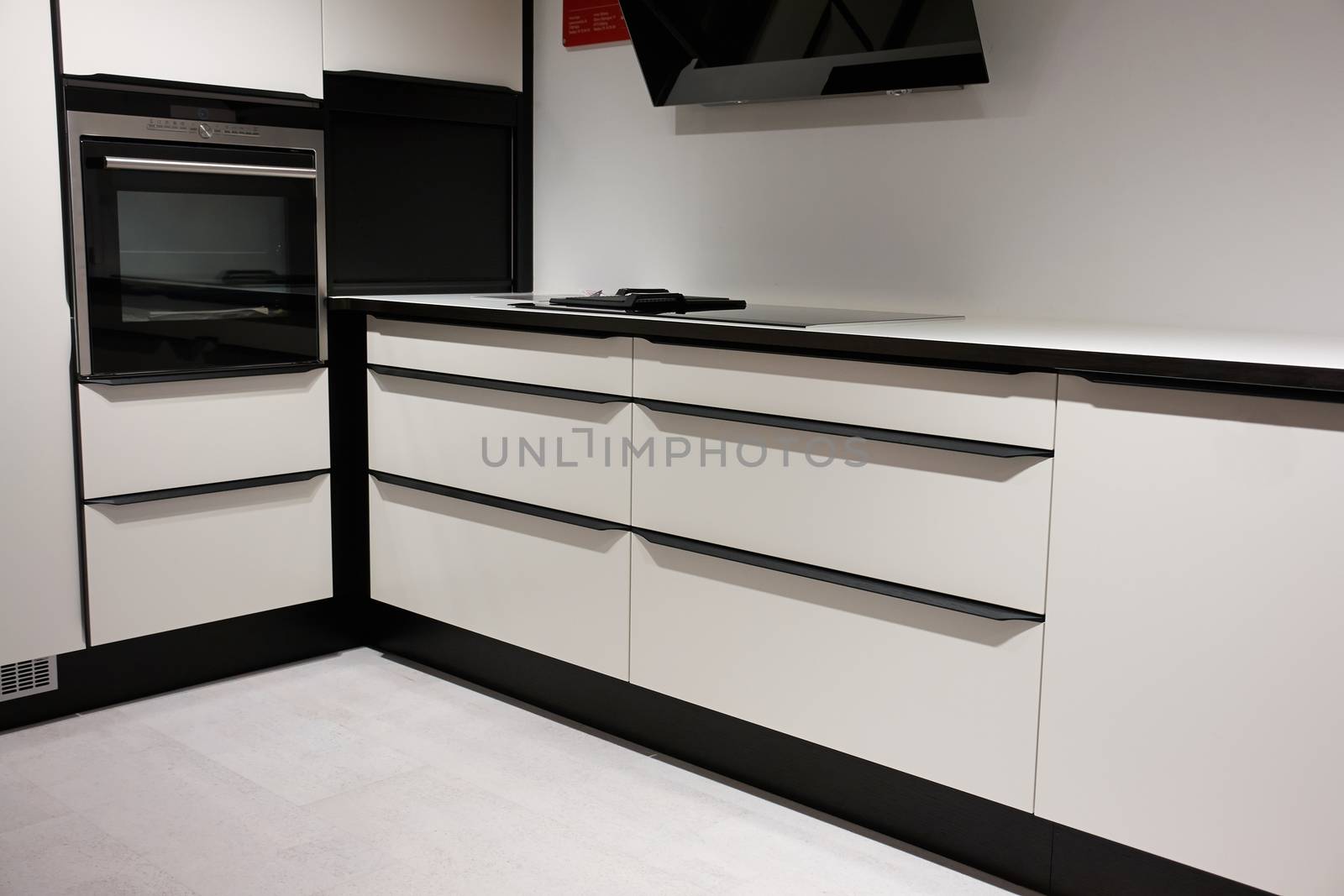 Modern trendy design wooden black and white kitchen                               