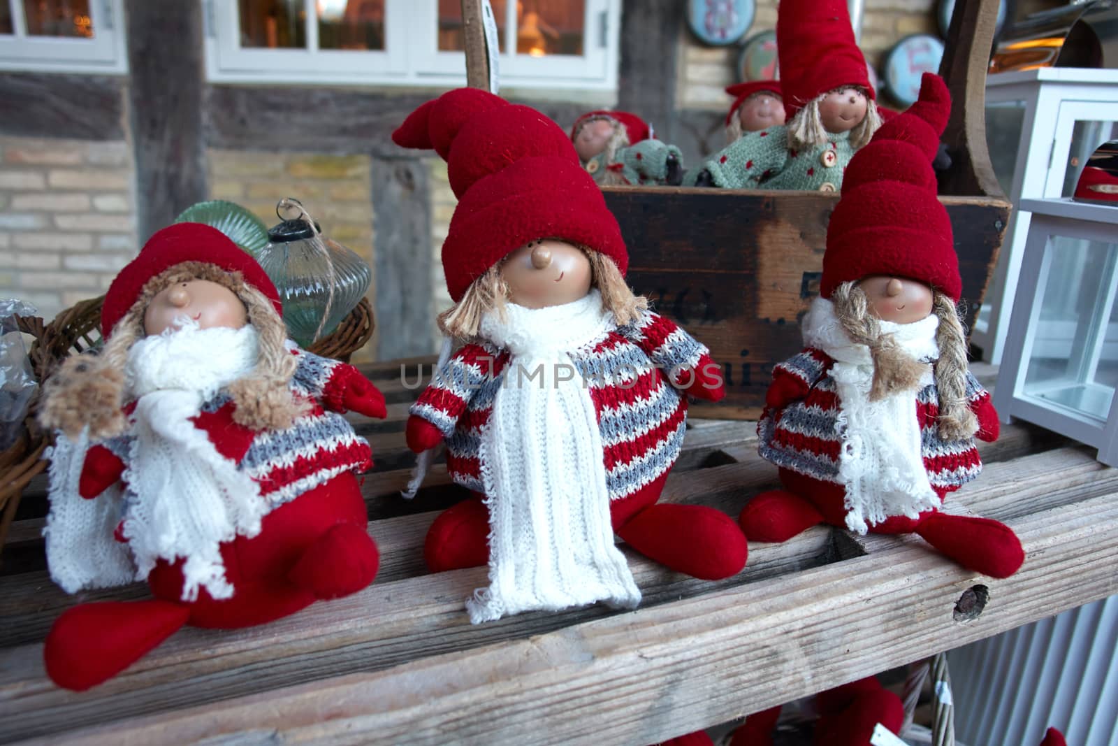 Creative handmade Christmas dolls in a market fair                               