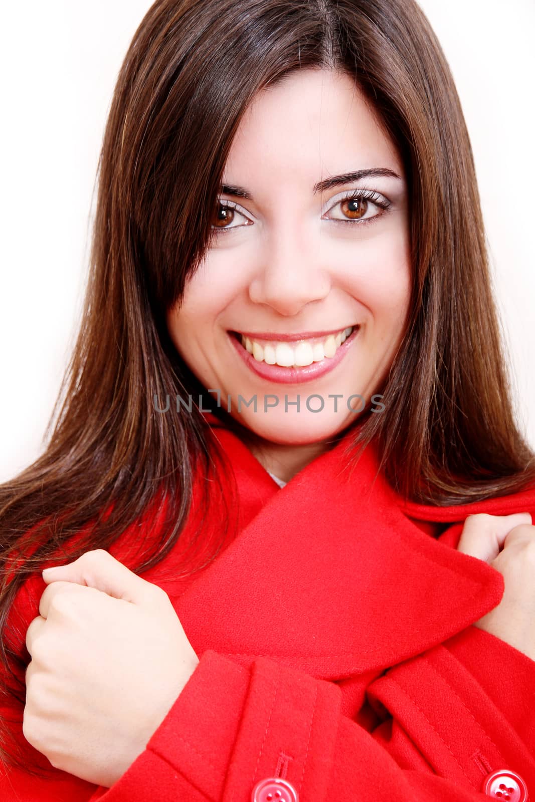 A attractive young, latin Adult woman in Winter clothing. Isolated on white.