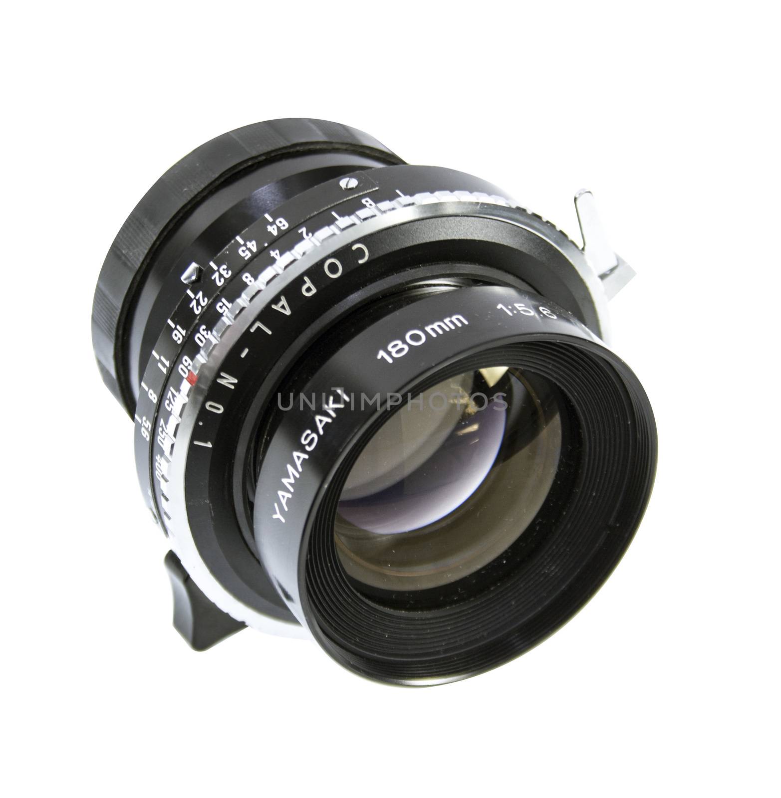 An old manual control camera lens isolated on white.