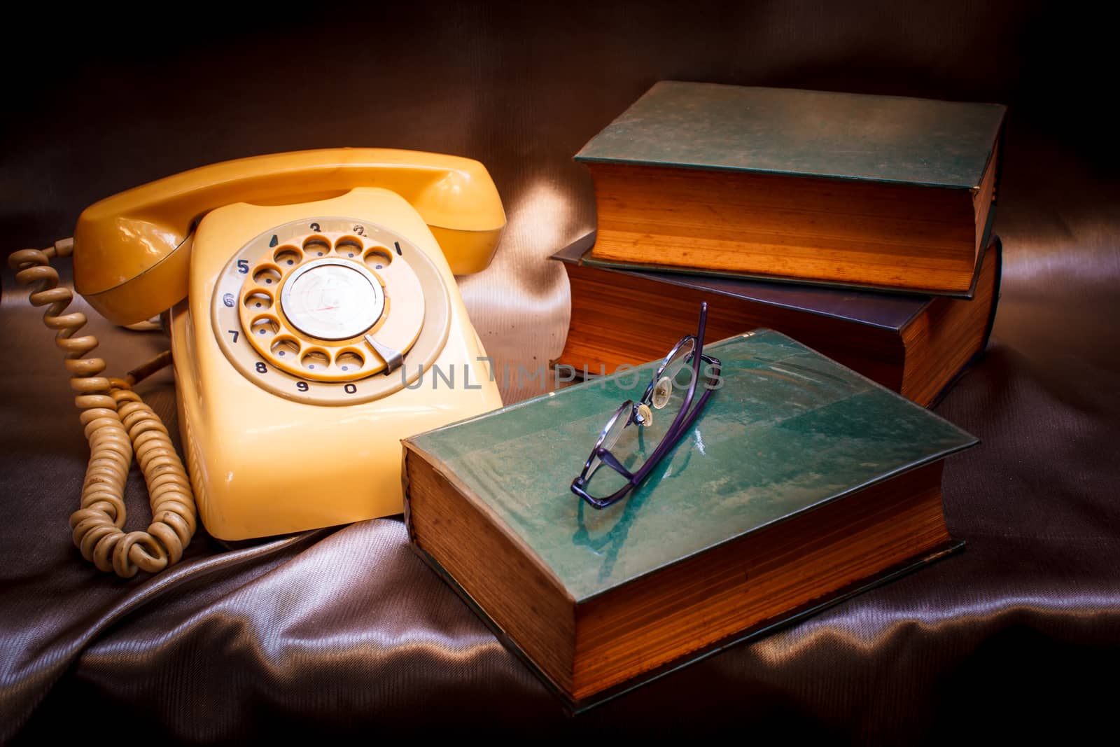 retro phone and book in vintage style.