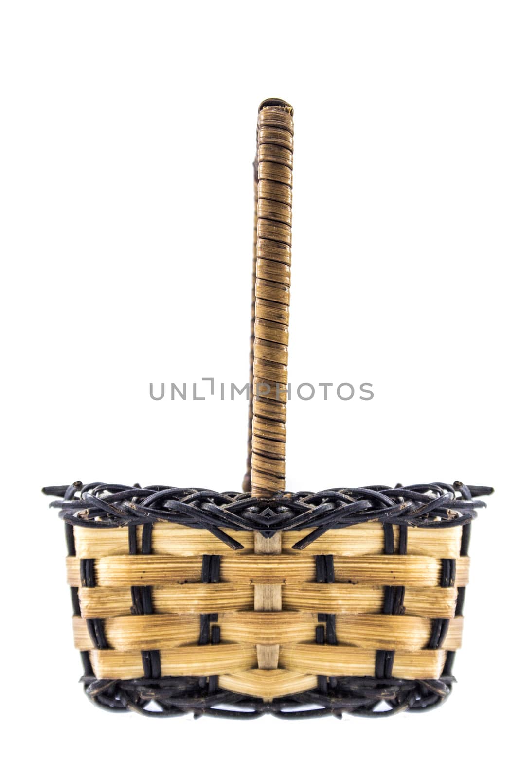 Small empty wicker basket isolated on white background