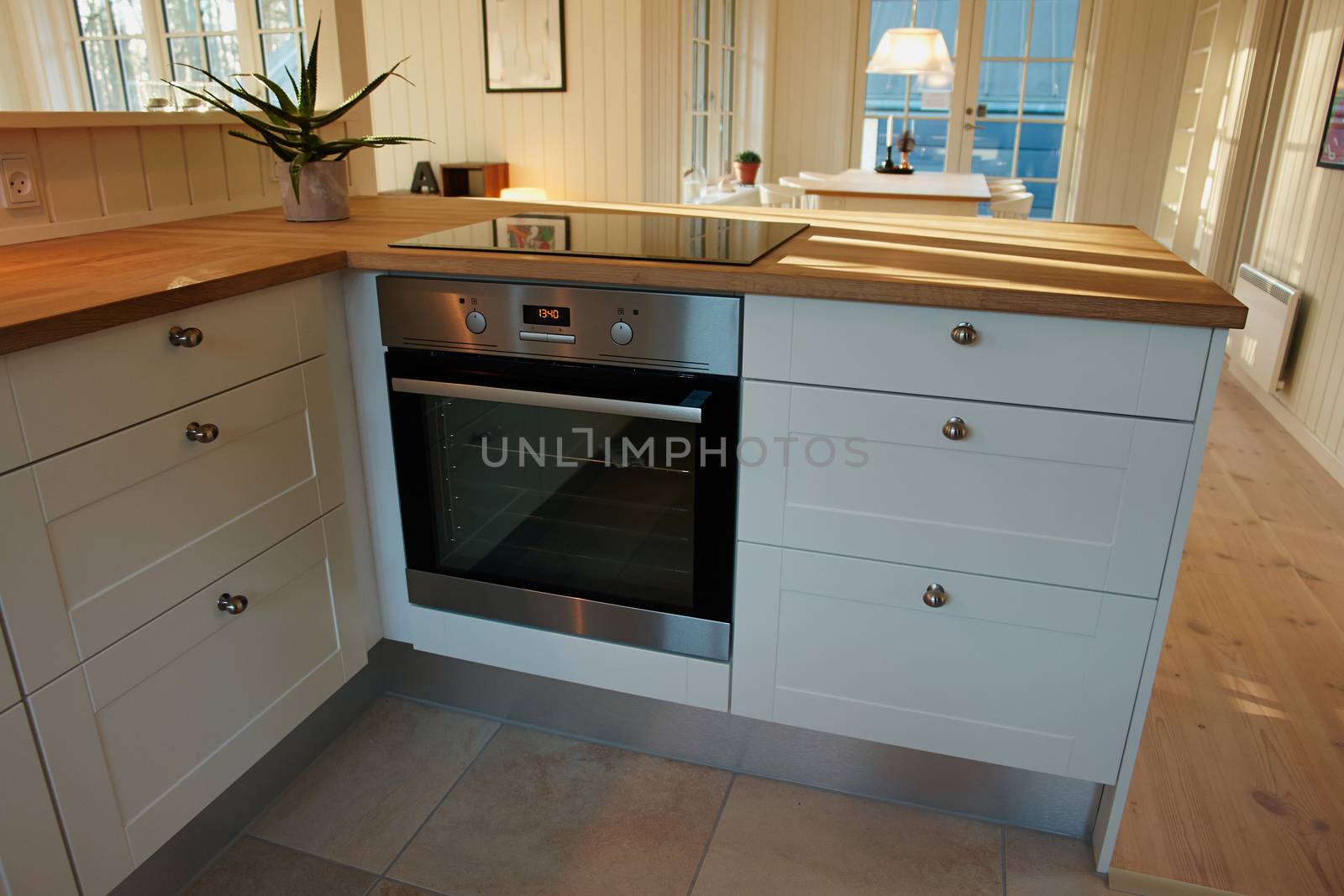 Modern design trendy kitchen with white and wood elements