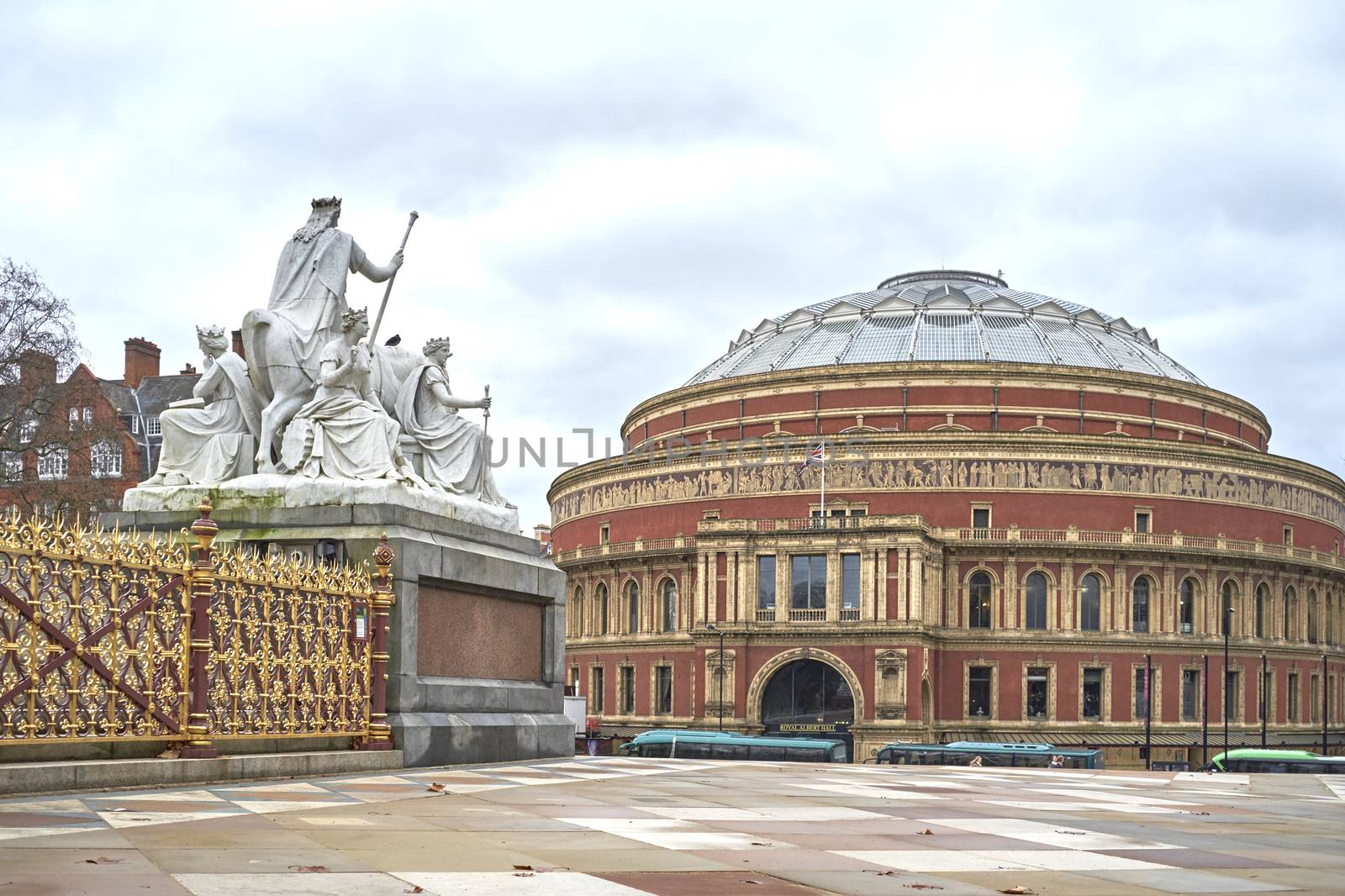 LONDON, UK - DECEMBER 17: Detail of Albert Memorial statue looking at Royal Albert Hall in the background, in Kensington Gardens. December 17, 2014 in London.