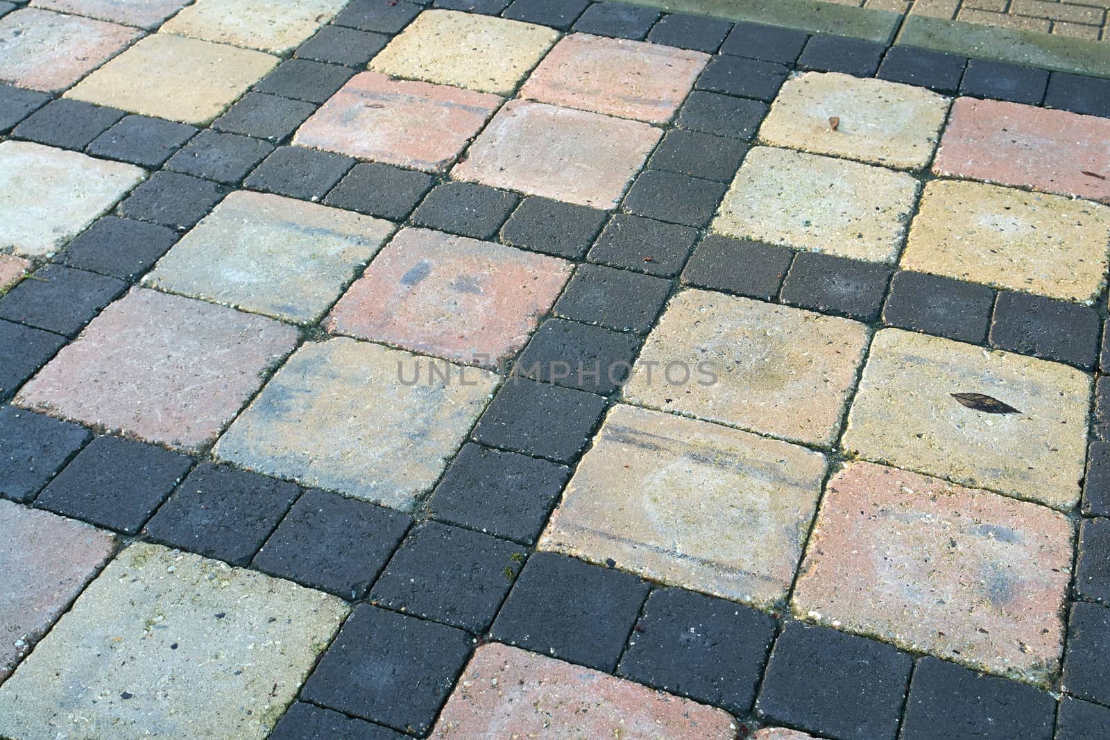 Details of dark gray brown crafted stone garden tiles floor