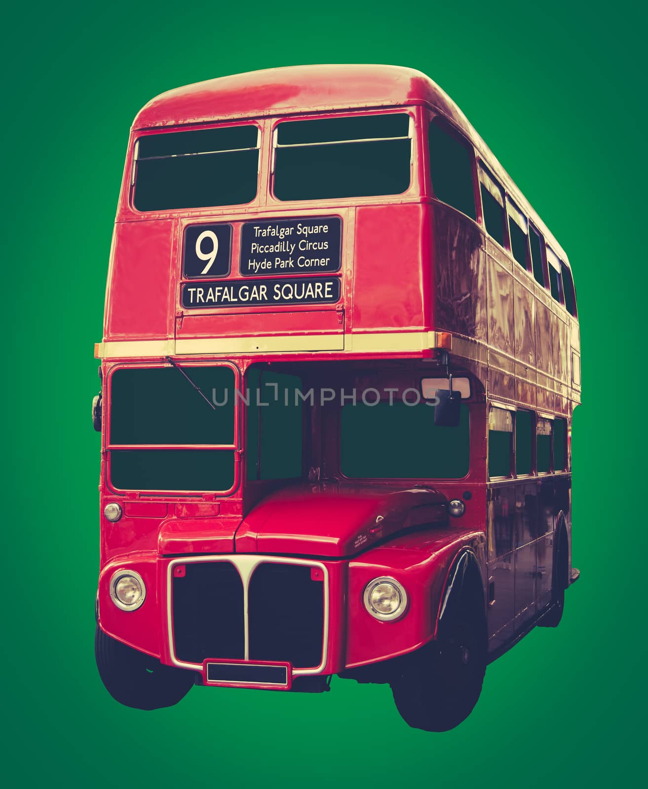 Vintage Iconic Red London Bus On A Green Background