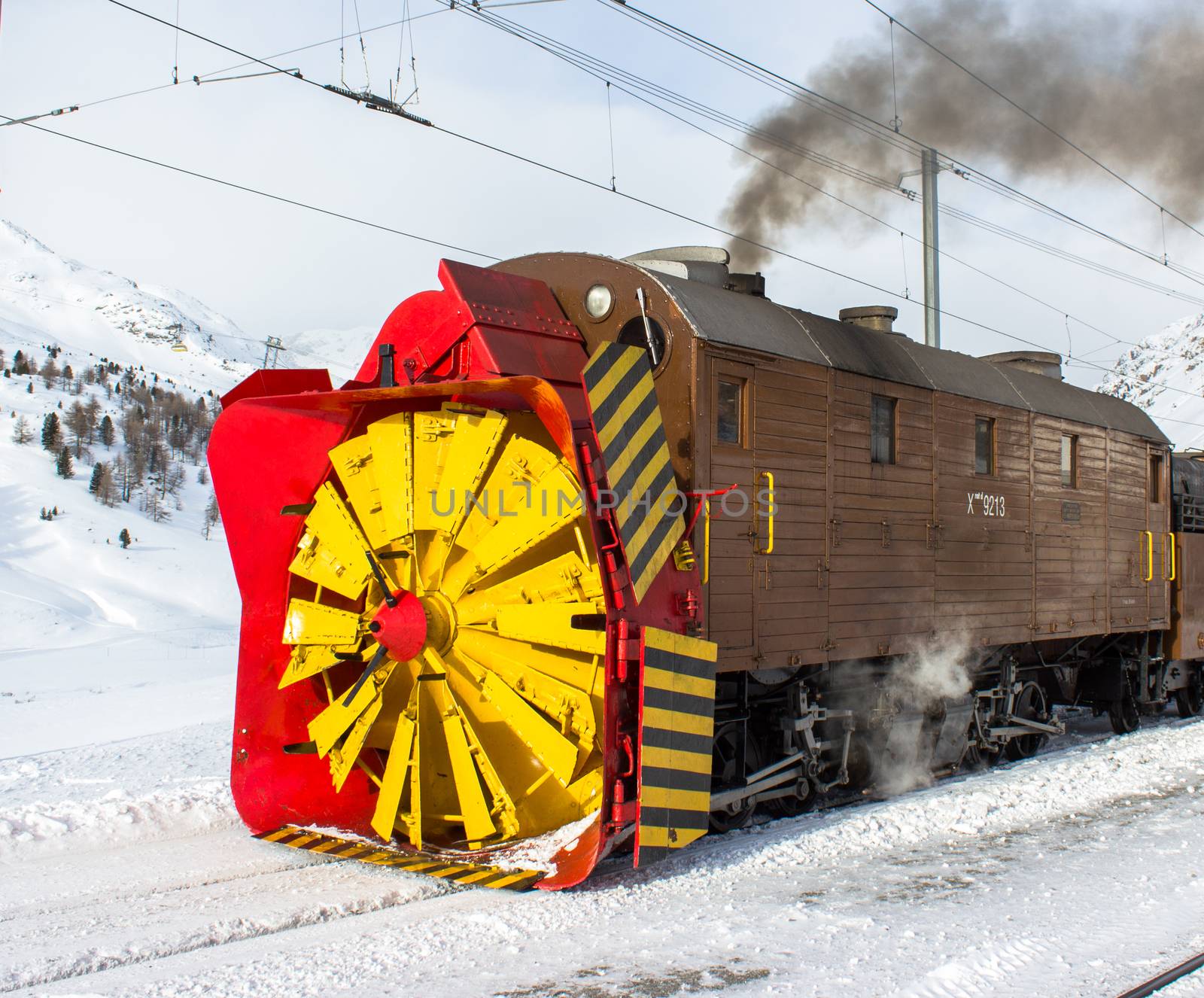 Snowplow steam, along the line of bernina in Swiss