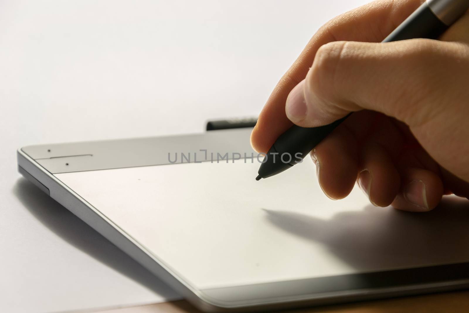 Close-up of a graphic tablet with his pen tool by enrico.lapponi