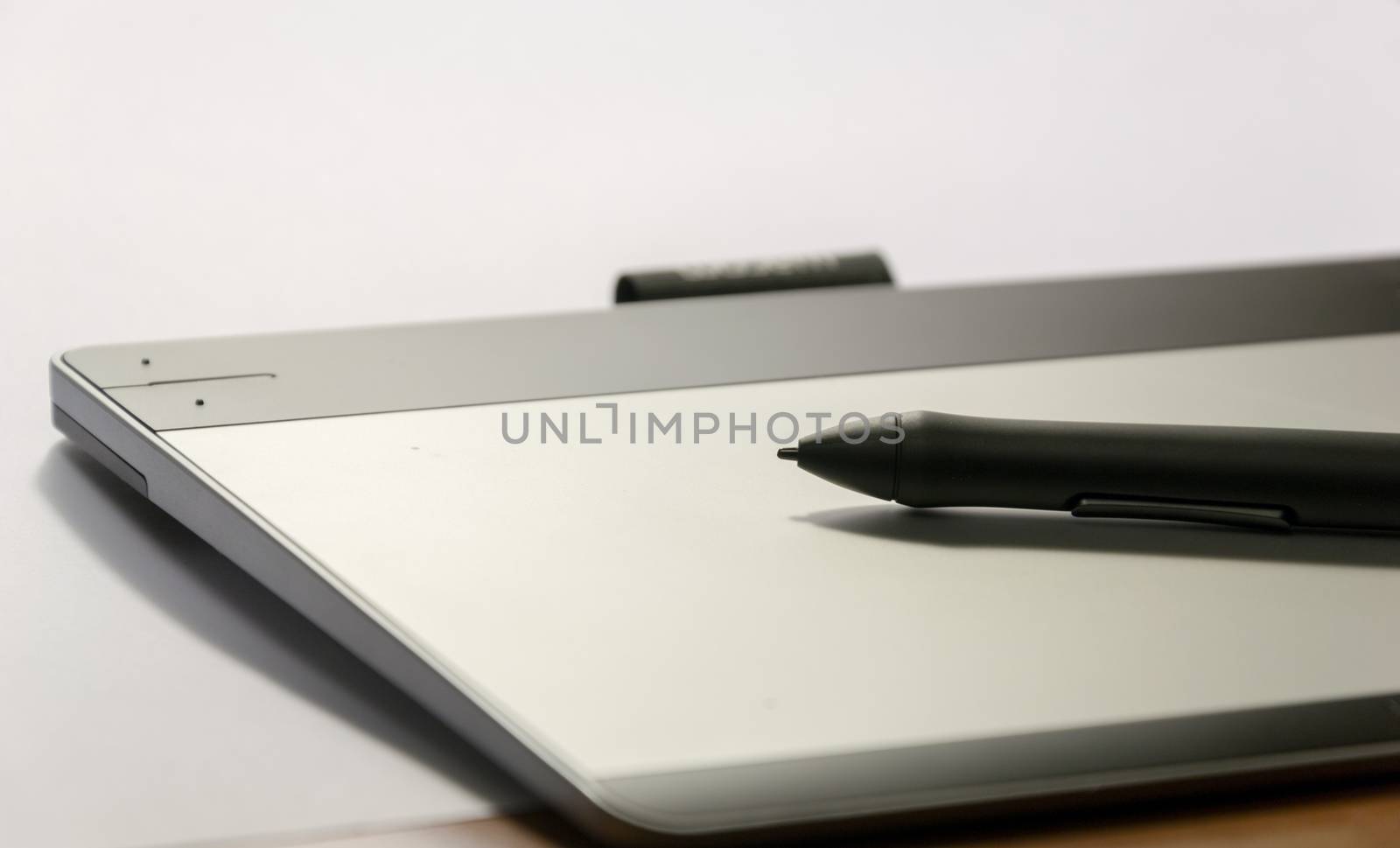 Close-up of a graphic tablet with his pen tool