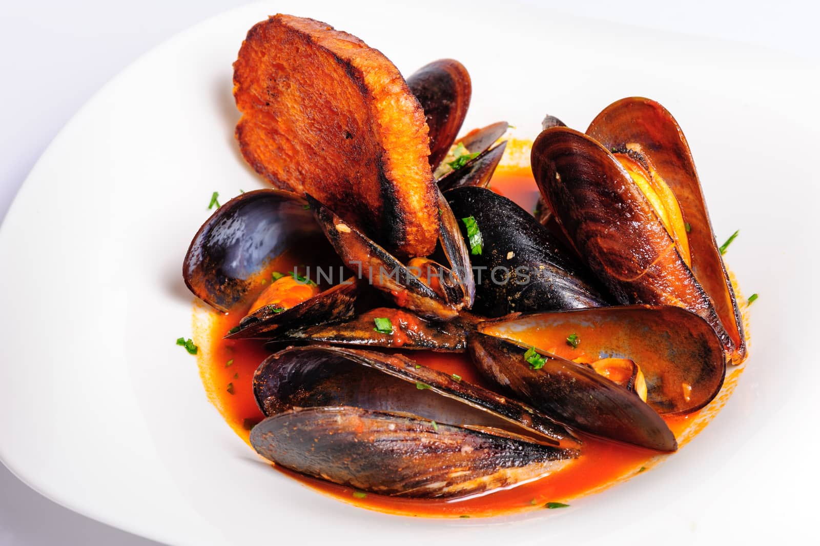 Mussels prepared in italian rustic style with wine and parsley