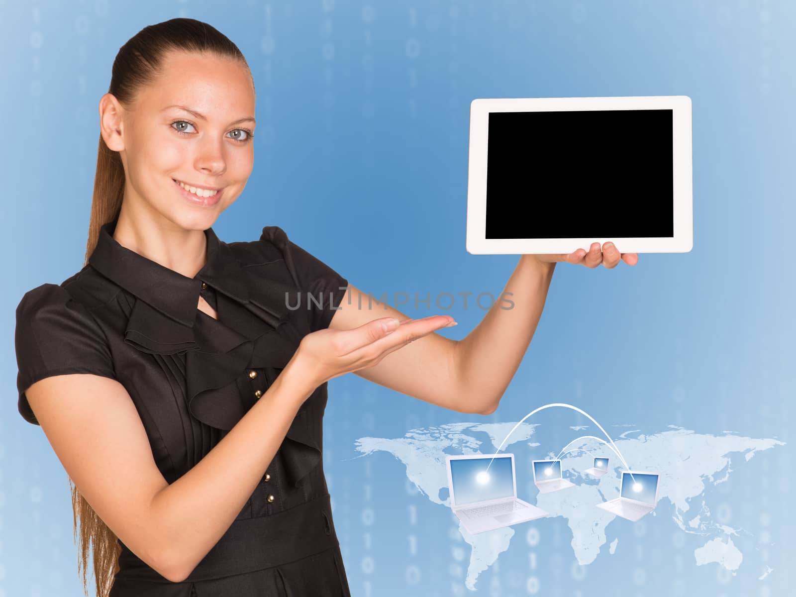 Beautiful businesswoman demonstrating blank tablet PC. World map, laptops connected to network and figures as backdrop by cherezoff