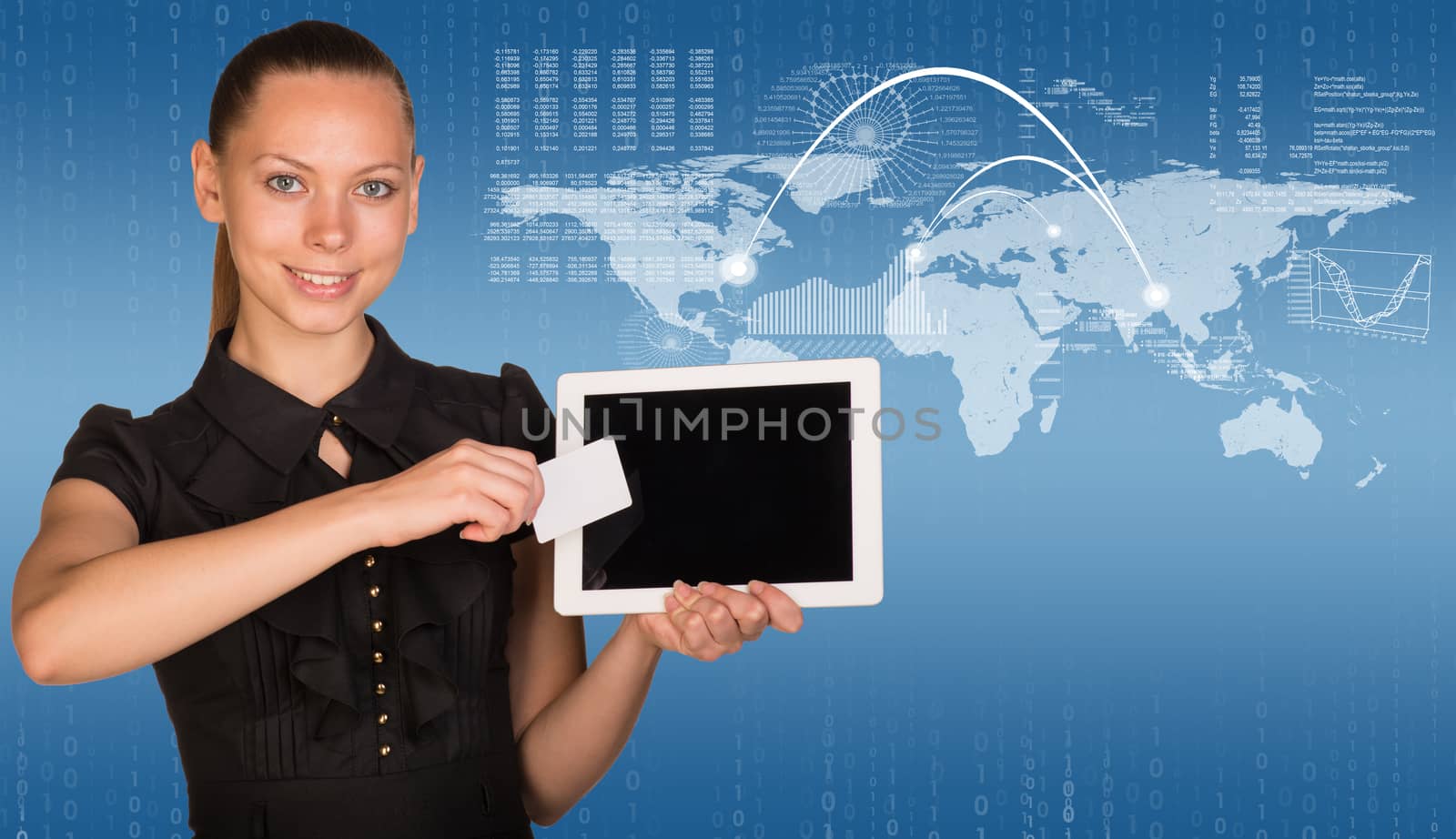 Beautiful businesswoman holding blank tablet PC and blank business card in front of PC screen. World map with conventional communication lines, figures and hi-tech graphs with various data as backdrop