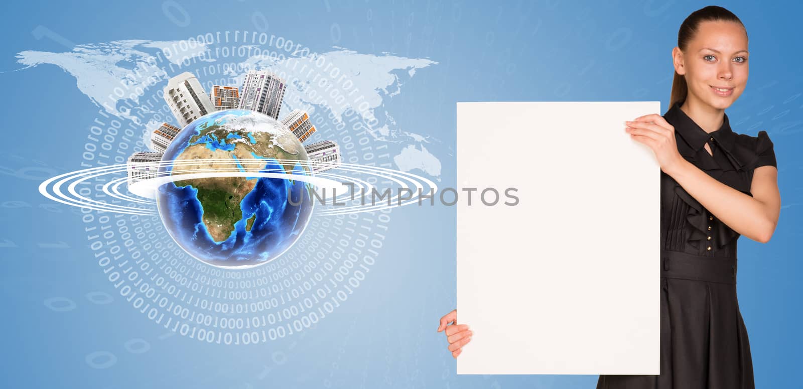 Beautiful businesswoman holding blank paper sheet. Beside is miniature Earth with houses on it by cherezoff
