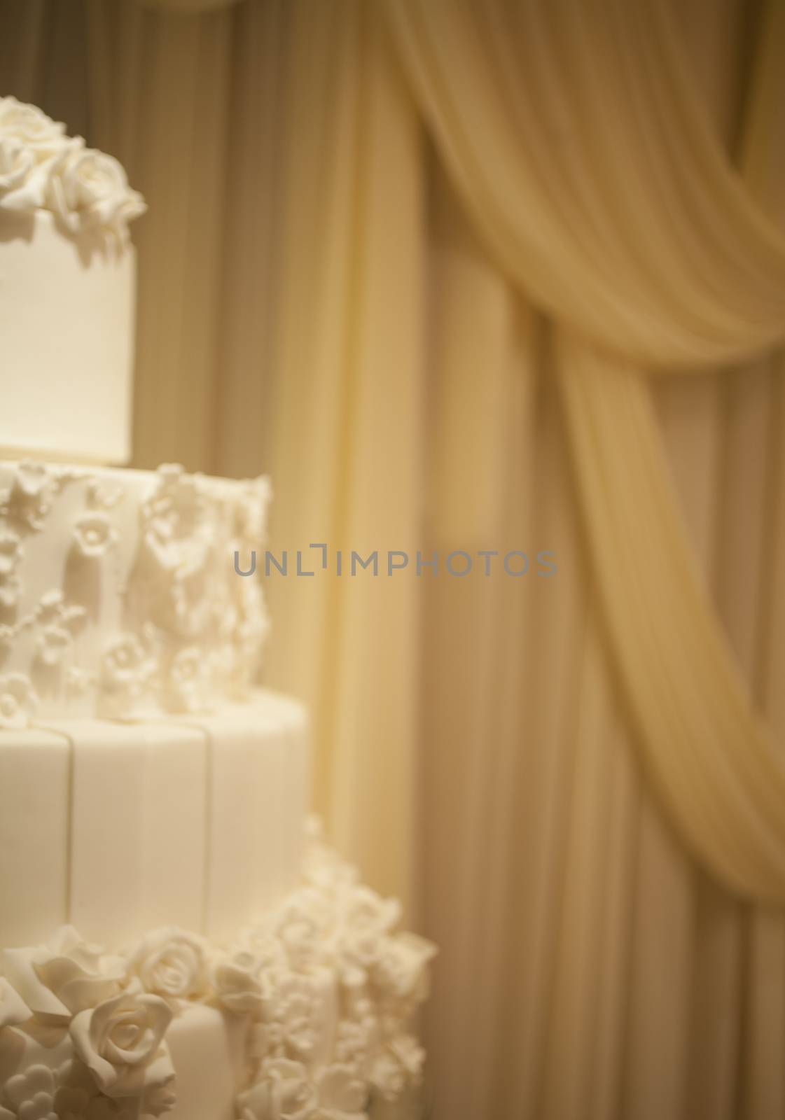 Wedding cake in banquet dinner reception party by edwardolive