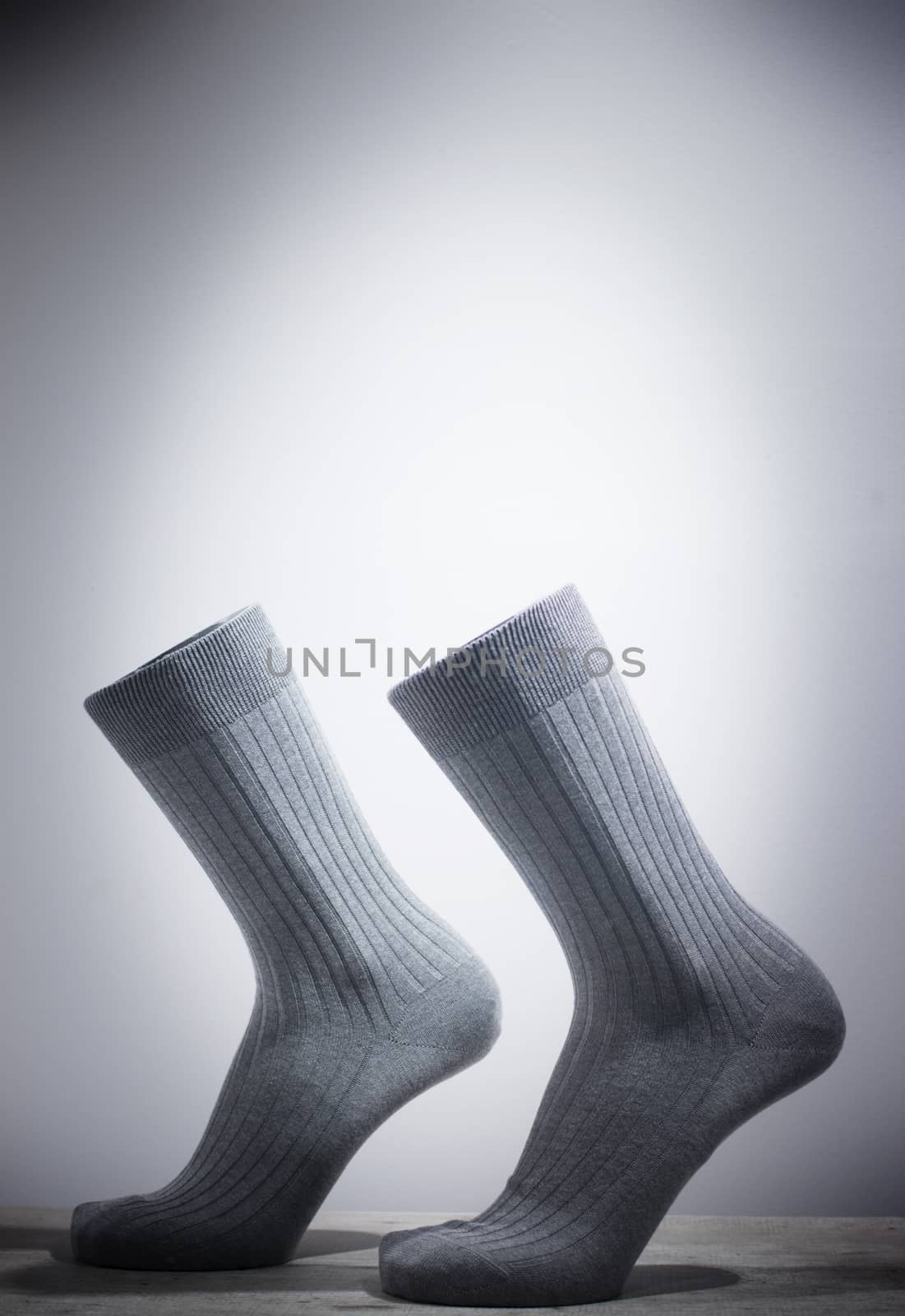 Surrealist socks and feet walking without legs  by edwardolive