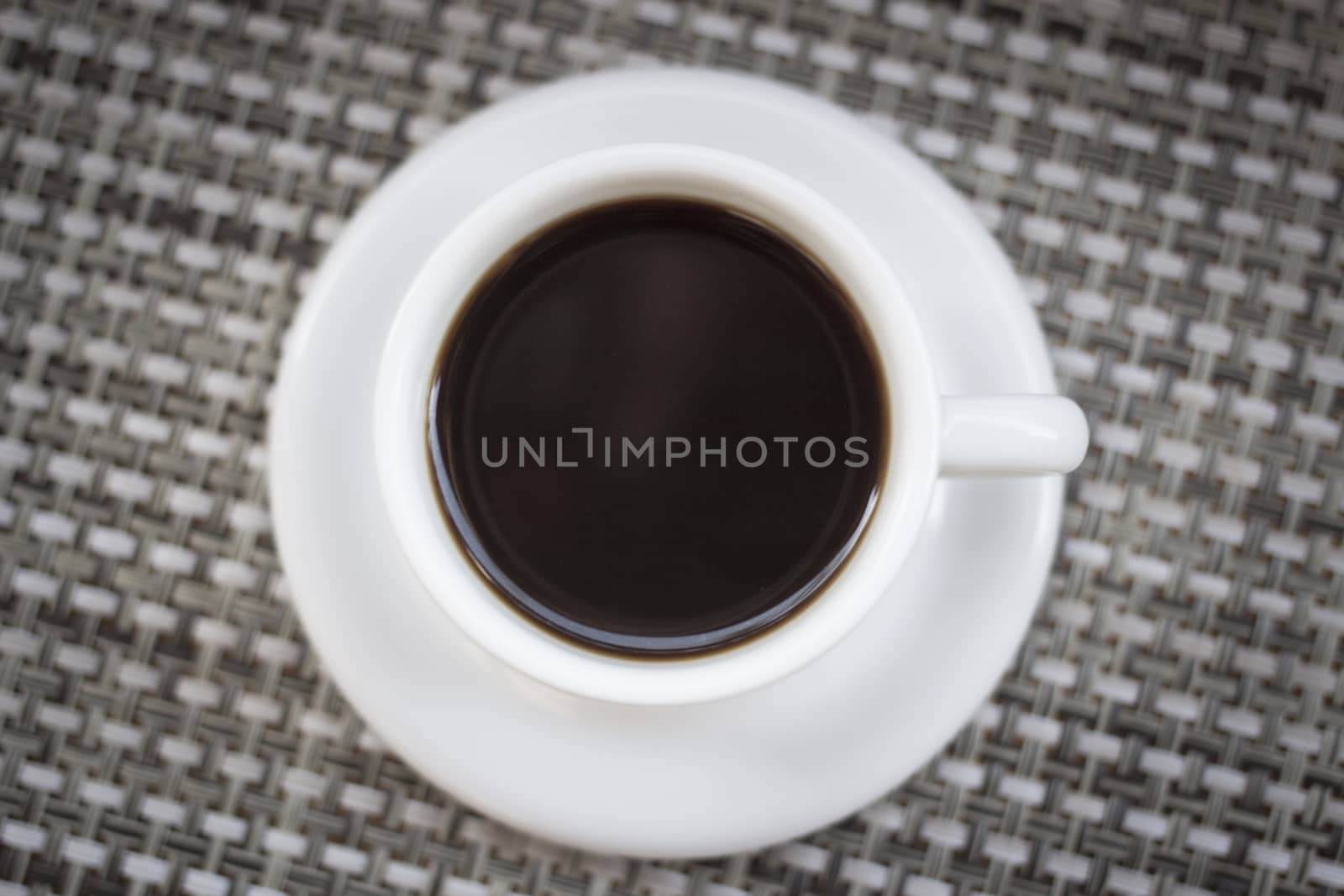 Coffee expresso in cup and saucer shot from above. 