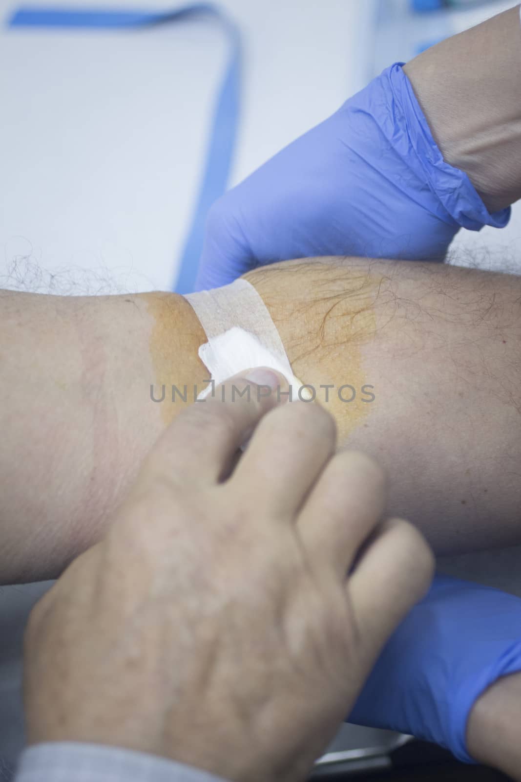 Nurse and male patient blood sample donation by edwardolive