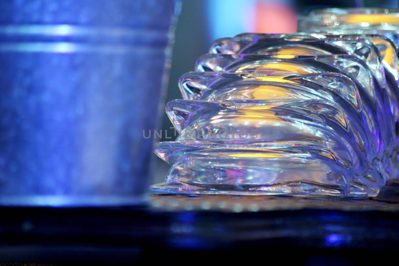 Cigarette ash trays in nightclub bar close-up by edwardolive