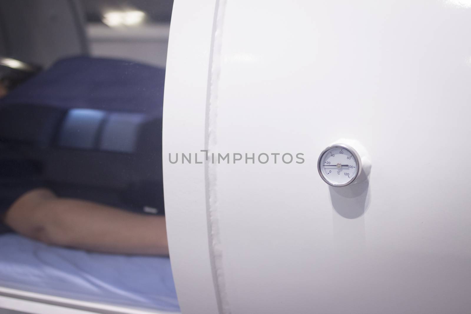 Female patient in oxygen hyperbaric chamber HBOT by edwardolive