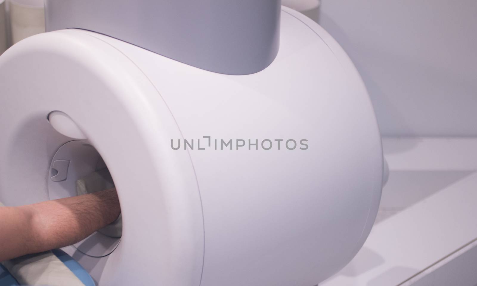Patient and Doctor in fully open MRI CAT Scan by edwardolive