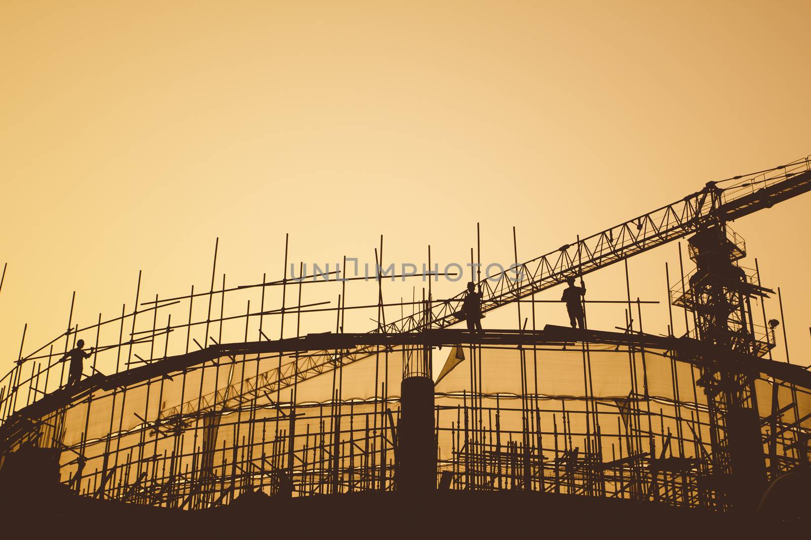 Construction workers and scaffolding 