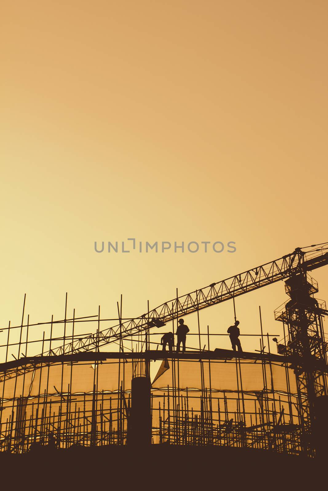 Construction workers and scaffolding 