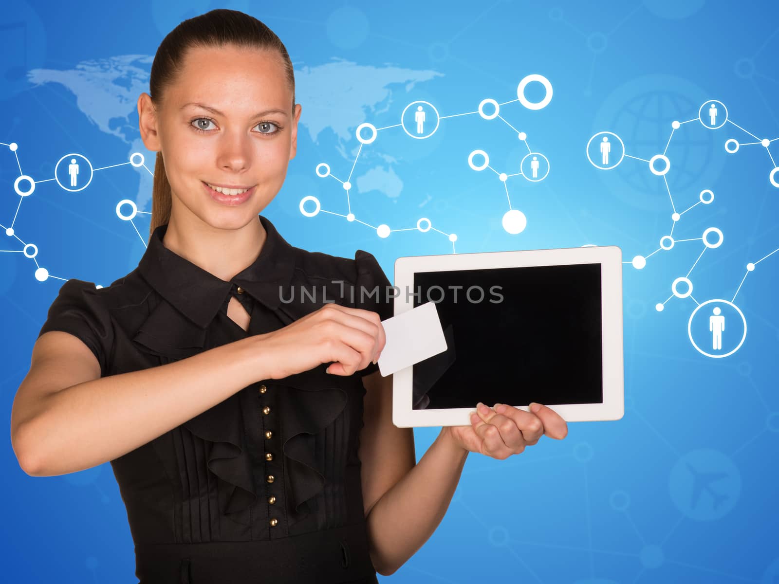 Beautiful businesswoman holding blank tablet PC and blank business card in front of PC screen. Network with people icons and world map as backdrop