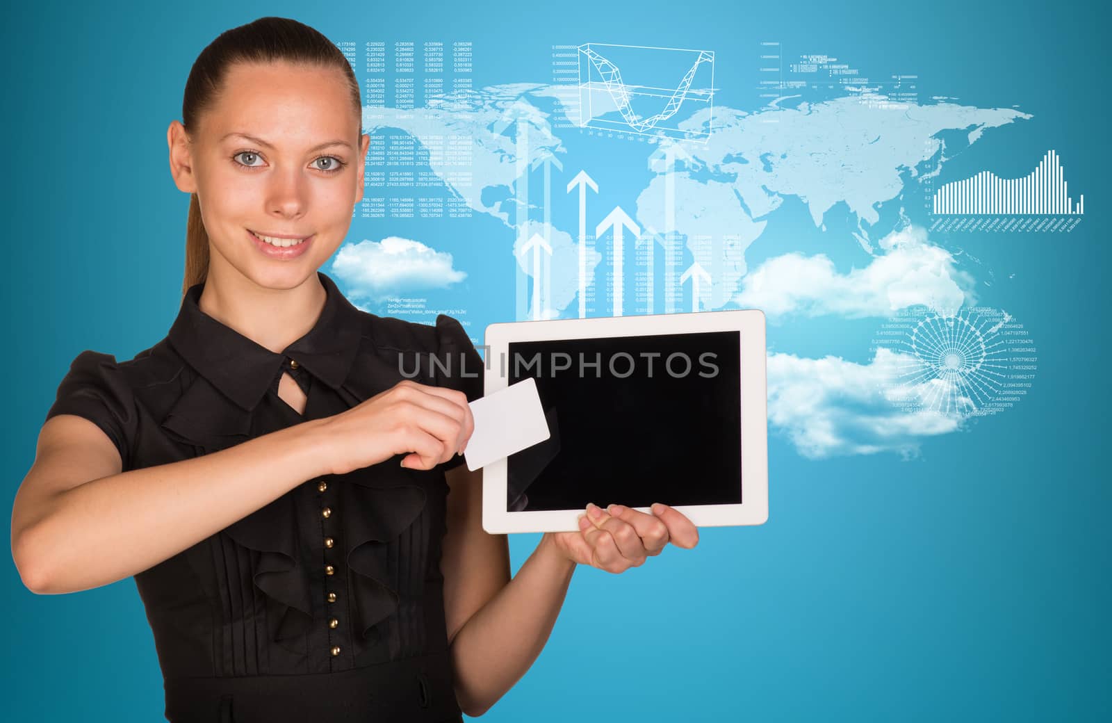 Beautiful businesswoman holding blank tablet PC and blank business card in front of PC screen. World map, clouds and hi-tech graphs with various data as backdrop