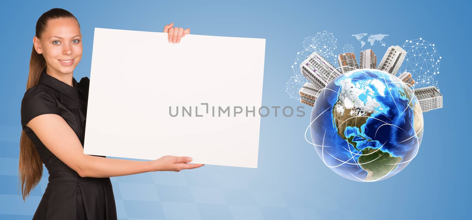 Beautiful businesswoman holding blank paper sheet. Beside is miniature Earth with houses on it and surrounded by conventional communication lines and other virtual elements. Elements of this image furnished by NASA