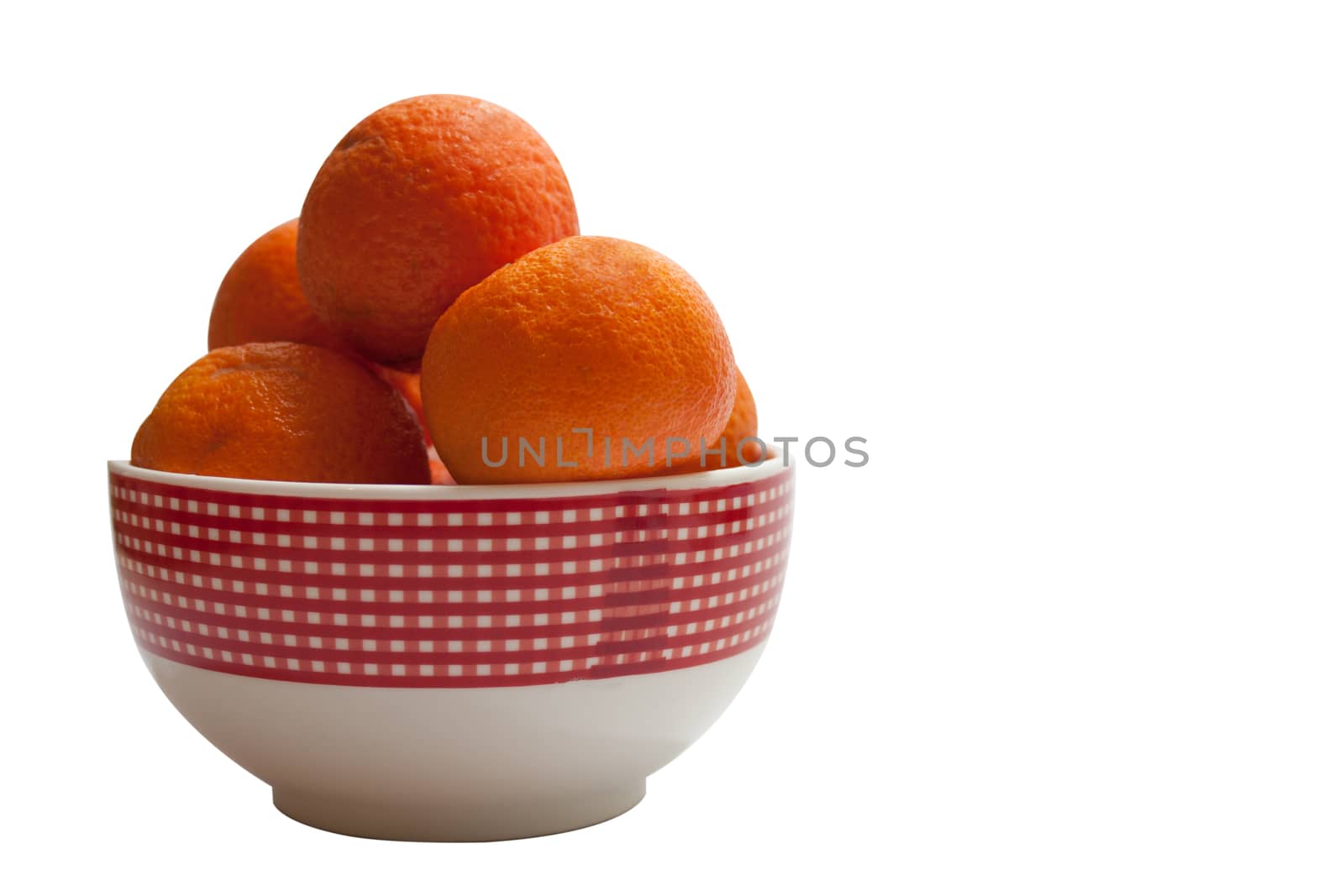 Tangerines in a bowl on the white background.