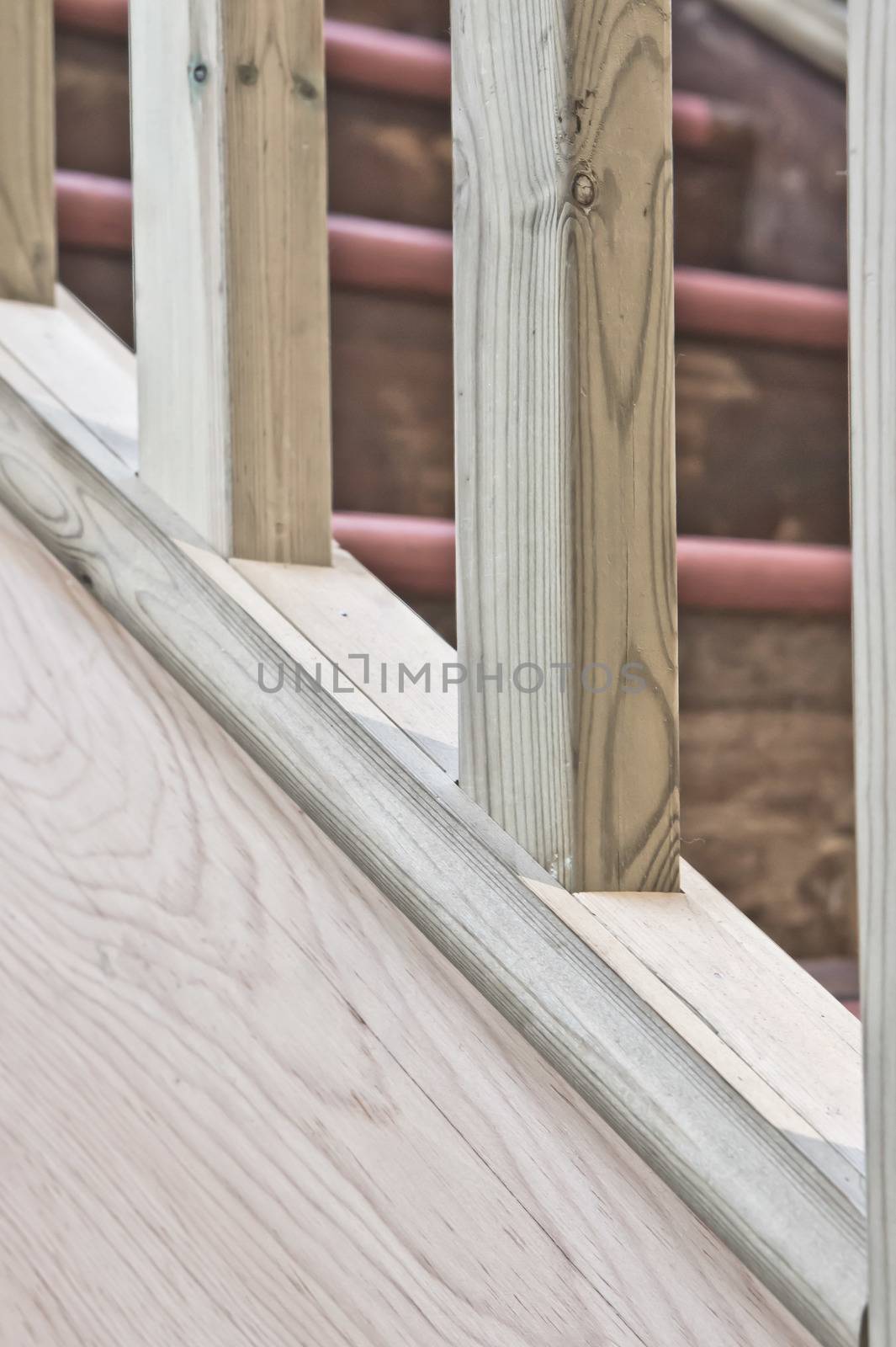 Close up of part of a wooden stair bannister