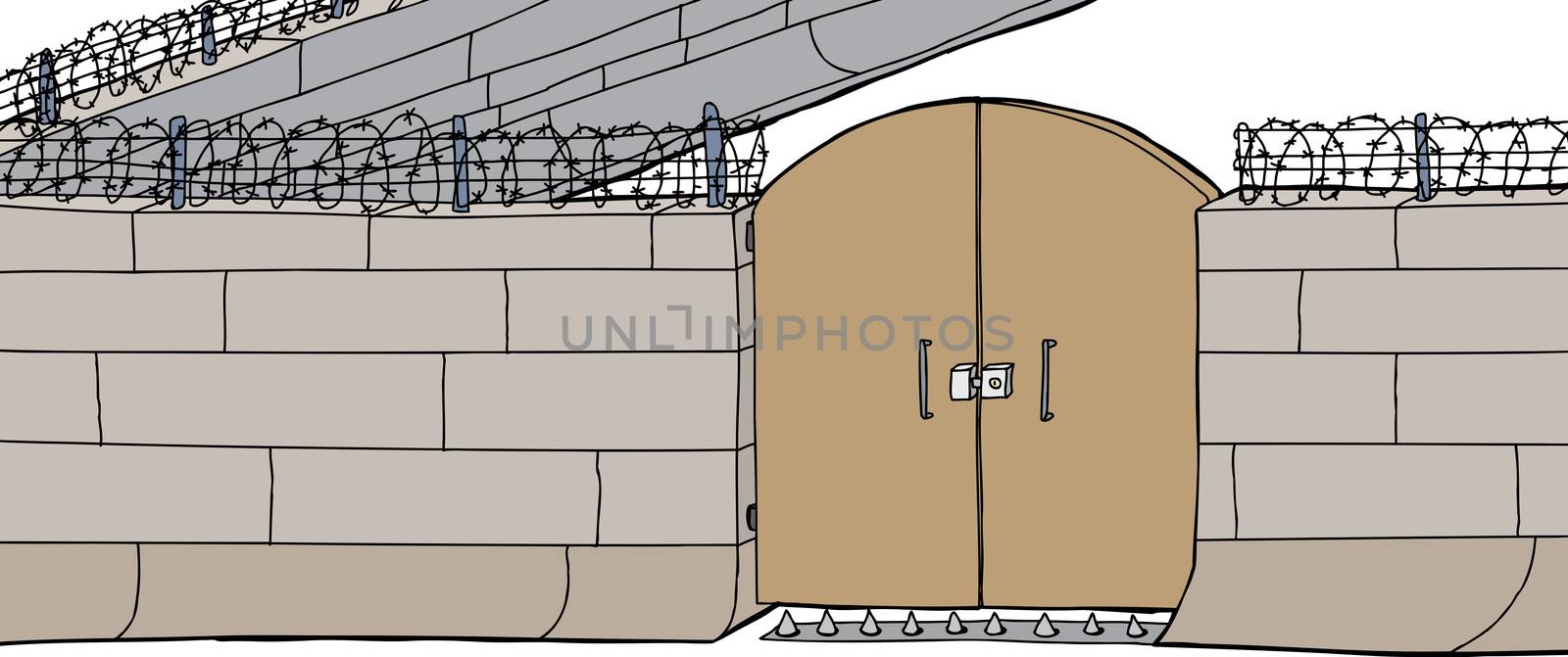 Large doors on prison wall with barbed wire
