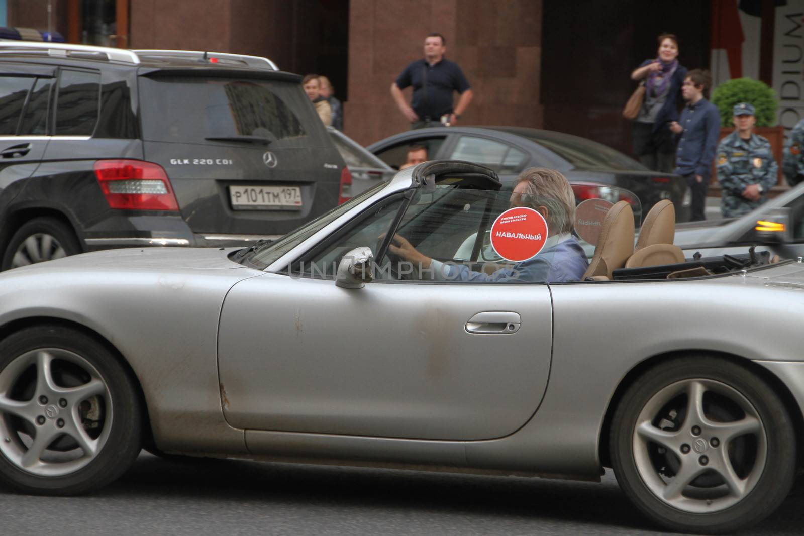 Moscow, Russia - July 18, 2013. Drivers supported opposition politician Alexei Navalny. Thousands of Muscovites went on this day in support of arrested opposition leader Alexei Navalny