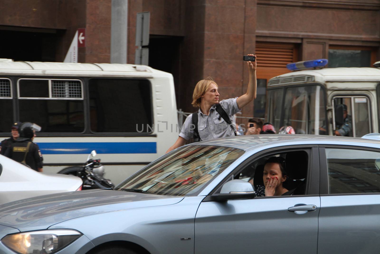 Moscow, Russia - July 18, 2013. Drivers supported opposition politician Alexei Navalny. Thousands of Muscovites went on this day in support of arrested opposition leader Alexei Navalny