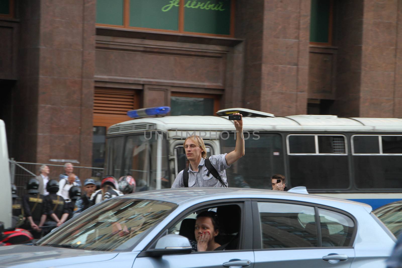 Moscow, Russia - July 18, 2013. Drivers supported opposition politician Alexei Navalny. Thousands of Muscovites went on this day in support of arrested opposition leader Alexei Navalny