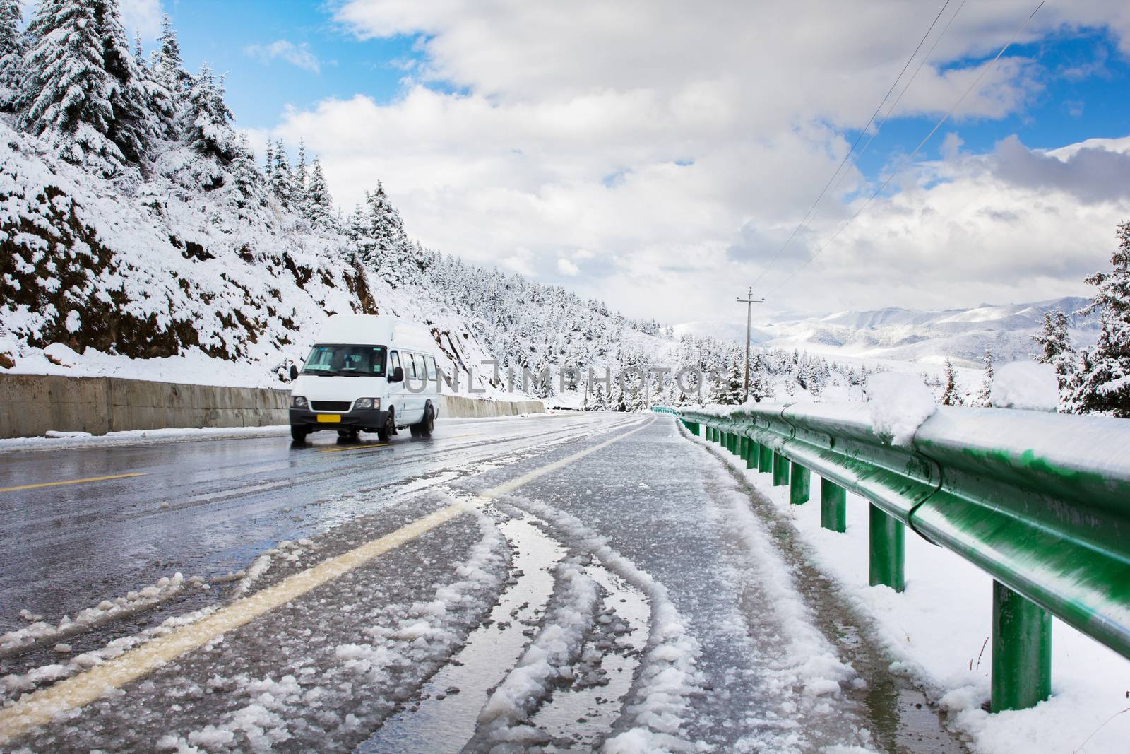 Drive car on slippery road from melt snow