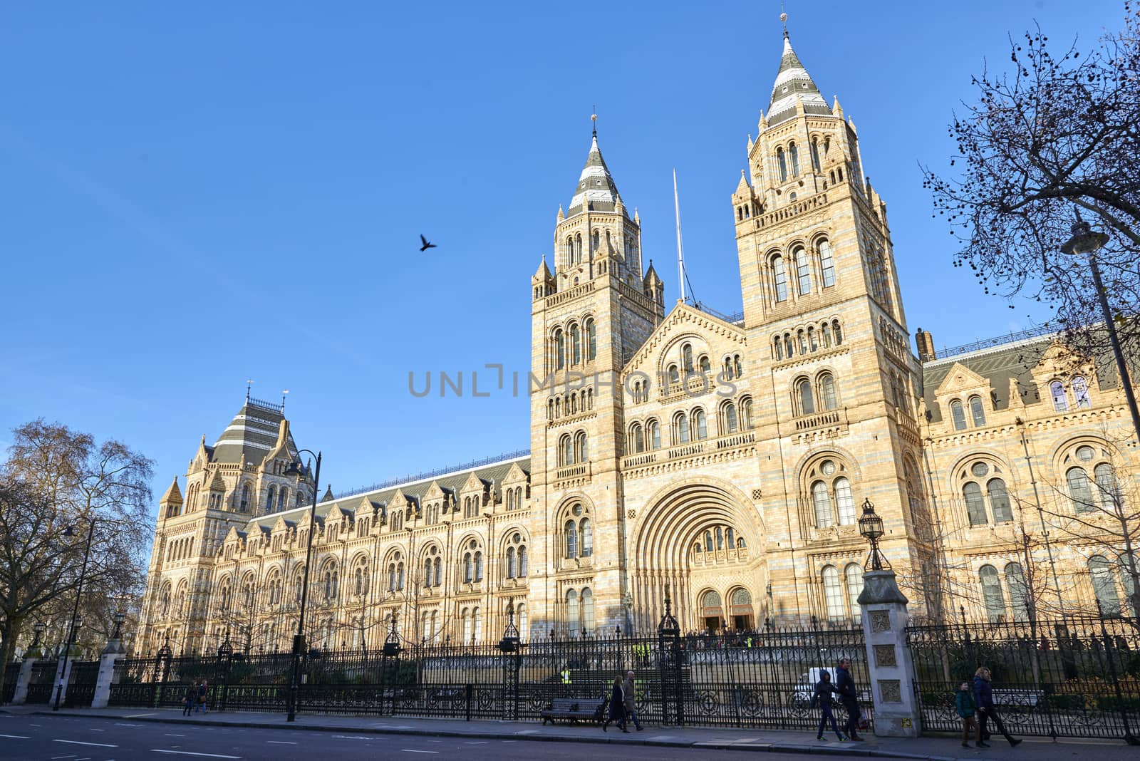 LONDON, UK - DECEMBER 20: Facade of the Natural History museum in bright sunny day. December 20, 2014 in London.